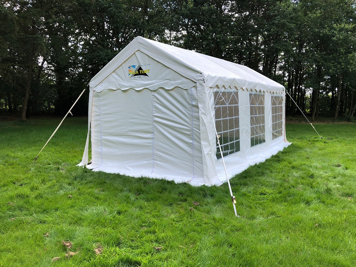 6mx3m party tent self erect or erected, will seat 20 persons.